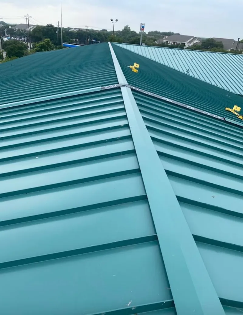 Green commercial metal roof ridge and valley for Metal Roof Repair in West Deer