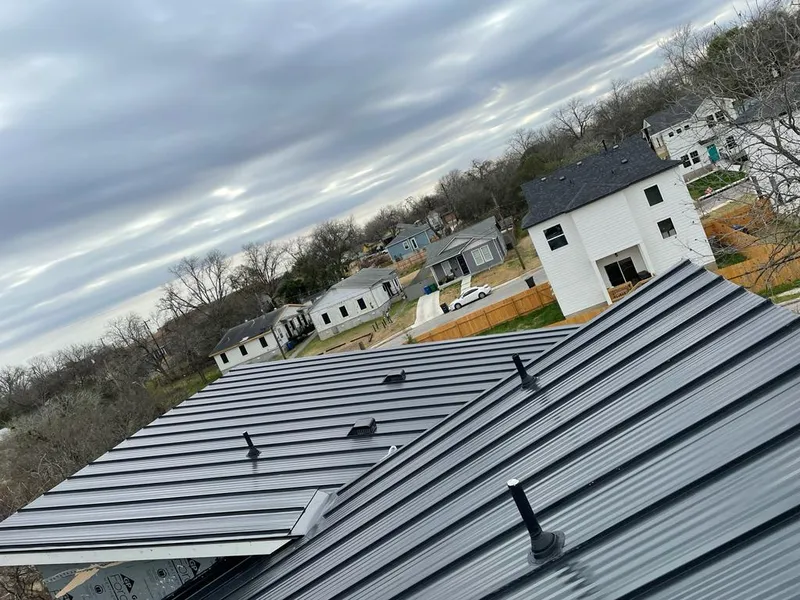 Standing seam metal roof panels with vents for Skylight Repair in West Deer